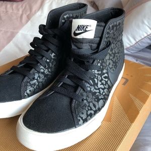 Rare Nike Black cheetah print high top.